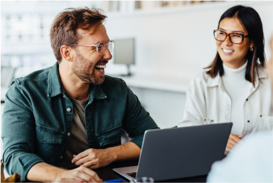 Certification Businesspeople laugh and smile joyfully in a meeting room