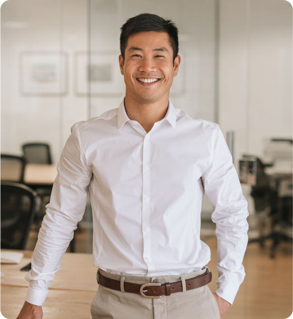 A professional smiling in an office setting