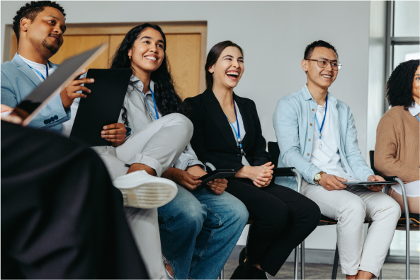 Colleagues laugh together