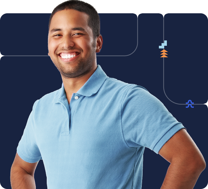 A person smiles wearing a light blue polo shirt