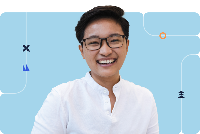 Smiling male professional wearing a white shirt in a blue background