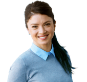 Close up of a young professional in a blue sweater against a grey background