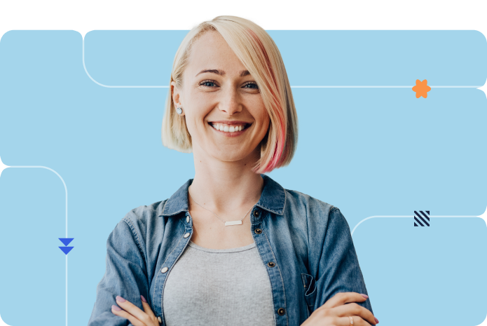 A person wearing a denim shirt smiles confidently against a blue background