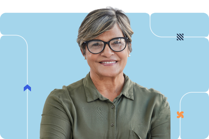 A person smiles professionally in a portrait against a blue background