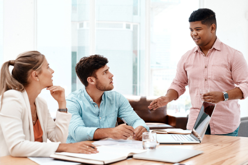 Group of people at a work desk